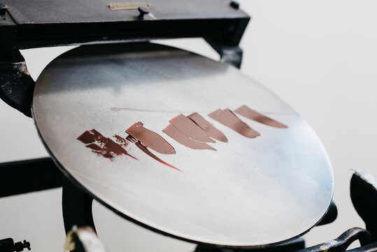 Letterpress artist in her studio