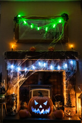 Haunted Halloween Fireplace theme with lights and cobwebs