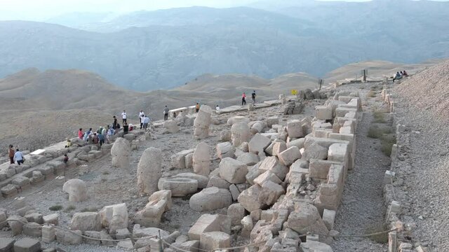 Mount Nemrut, Kahta, Adiyaman/Turkey-September 14 2020: Panoramic view of toppled heads of the gods on East terrace at the top of Mount Nemrut (Nemrut dagi in Turkish)