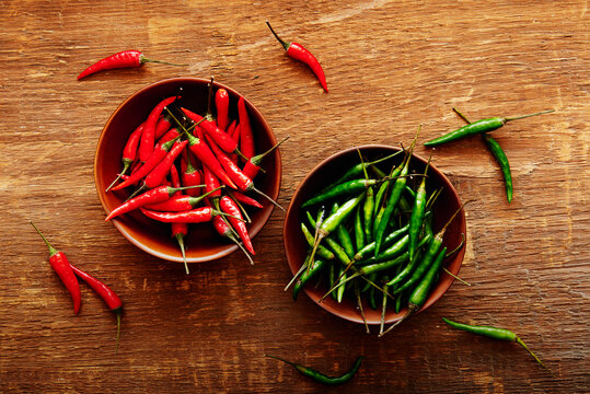 Bowls Green and Red Chilli Peppers