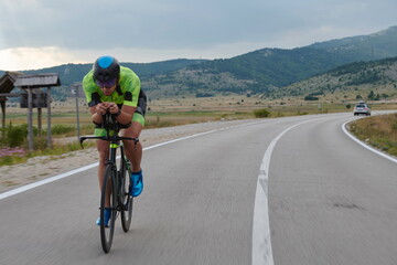 triathlon athlete riding bike