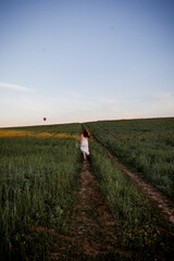 Fototapeta premium person walking on the road