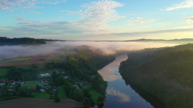 Thurnberger Stausee close to Krumau am Kamp in the Waldviertel region of Lower Austria. Aerial view of the lake during morning sunrise.