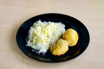 Cabbage salad and baked potatoes. Simple vegetarian meal.