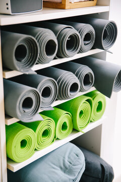 Mats and yoga accessories in a yoga studio
