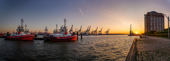 Panorama of Hamburg harbour at sunset