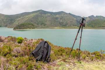 Lake view with backpack and trekking poles