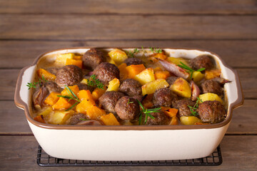 Meatballs with butternut squash and potatoes