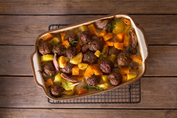 Meatballs with butternut squash and potatoes. View from above, top view
