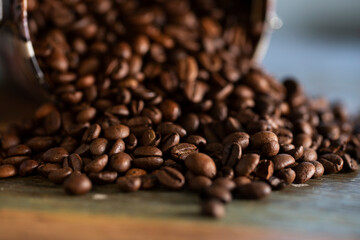 
Roasted coffee beans on wooden table