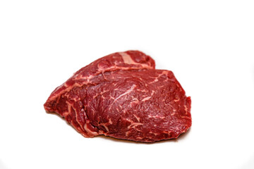 Ramp steak of raw marbled beef lies on a white background, isolated.