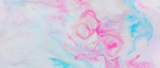 Fluid art. Multicolored background from liquid. Photography of colored spots on liquid. Abstract pattern