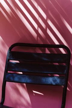 Chair on Pink Wall