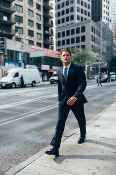 Businessman Walking in Manhattan Heading To Work , New York City