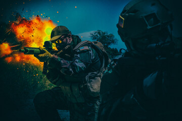 Army special operations forces soldiers, Navy SEALs team armed assault rifle, rushing on battlefield with fiery explosion, attacking enemy at night. Commando rifleman covering comrade with gunfire