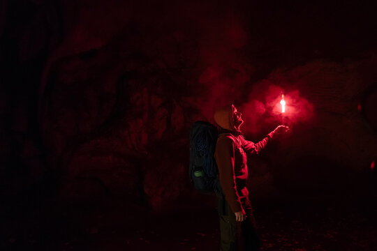 Red torch in a cave