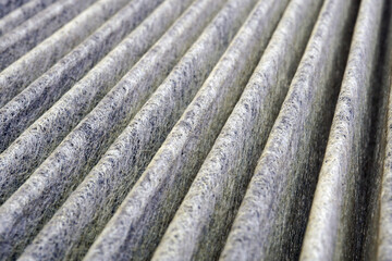 Antibacterial filter of a modern car air conditioner. Macro. The structure of the filter material.