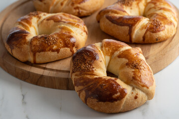 Acma with sesame seeds. Traditional Turkish pastry bread buns bagels.