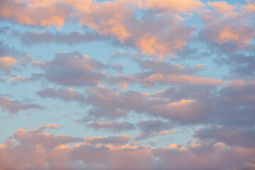 Beautiful sunset sky background with clouds. Scenic cloudscape.