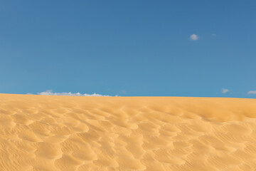 Fototapeta na wymiar desert sand against blue sky
