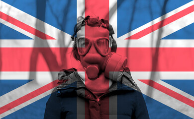Photo of woman wearing protective gas mask against the background of the United Kingdom flag. 