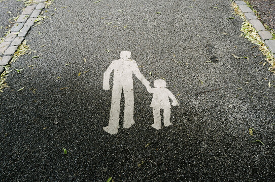 Parent and child pedestrian signage