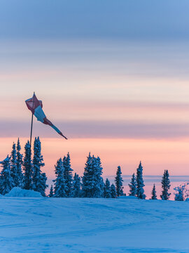 wintry twilight landscape scenery with carp flag floating on eagle plains,Yukon,Canada