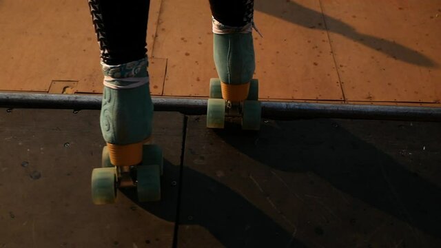 details of roller skates drop into halfpipe 