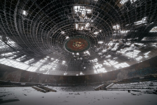 Abandoned building with broken ceiling in winter
