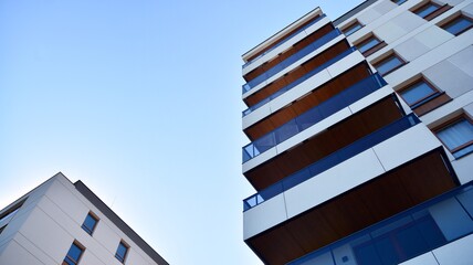 Multistoried modern, new and stylish living block of flats. Newly built apartment building.