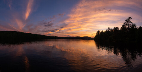 Fototapeta na wymiar Beautiful sunset view over the lake Témiscamingue in the Opemican national park, Canada