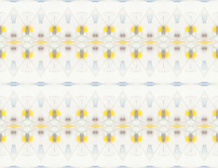 Delicate yellow pattern created by pebbles inside kaleidoscope