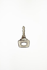 Ancient keys, used for long time. Vintage key on white background. Old key isolated. Keys on table. 