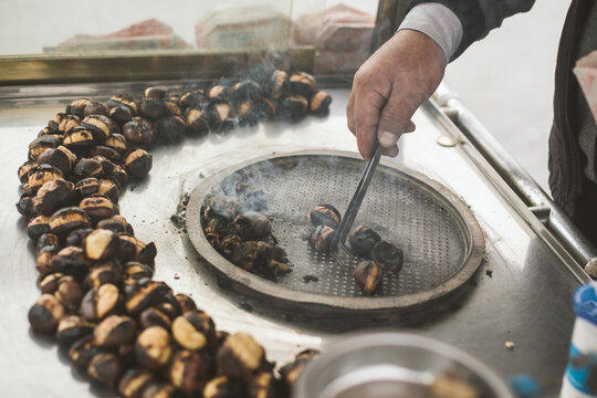 man roasting chestnuts, istanbul, turkey