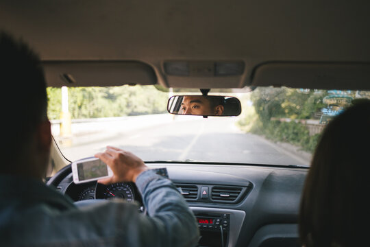 young man is using mobile navigation