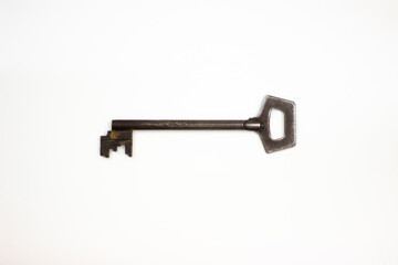 Ancient keys, used for long time. Vintage key on white background. Old key isolated. Keys on table. 