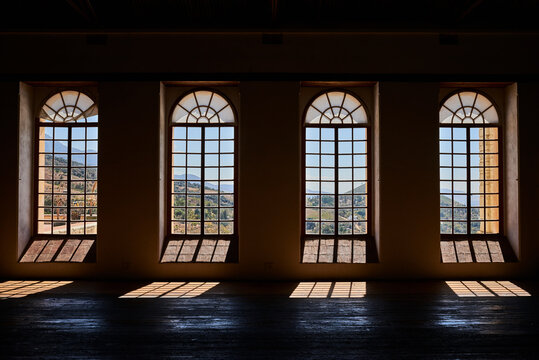 View of mountains through 4 large windows