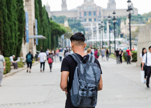 Man wandering and taking pictures in Barcelona