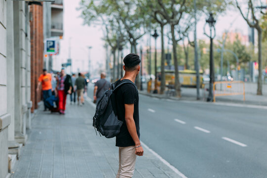 Man wandering and taking pictures in Barcelona