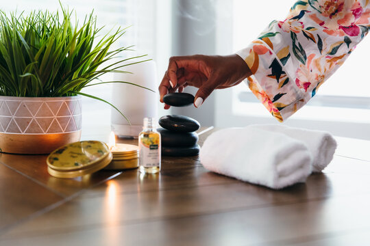 Black woman relaxing and meditating at home