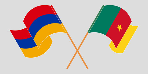 Crossed and waving flags of Cameroon and Armenia