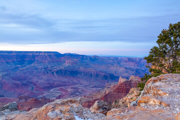 Scenic landscape view from Grand Canyon’s South Rim in winter during dramatic sunset