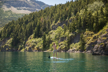 Kids Paddle Boarding in the rockies