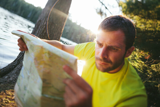 Adventurer reading a Map