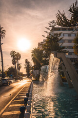 Water fountain at sunset in the coastal town of Torrevieja, Alicante, Valencian Community. Spain, Mediterranean Sea