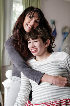 Portrait of an autistic child with her mother