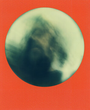Motion blur polaroid with orange circular frame