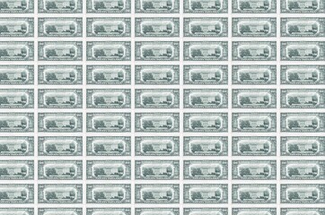 20 US dollars bills printed in money production conveyor. Collage of many bills. Concept of...