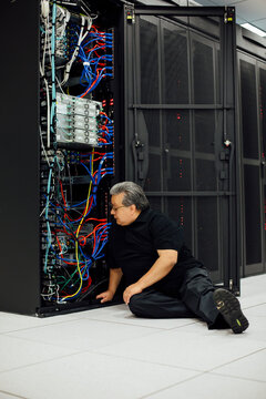 IT programmer trouble shooting computer problem