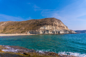 Beautiful white rock walls in Cala de Enmedio in the natural park of Cabo de Gata, Nijar, Andalucia. Spain, Mediterranean Sea